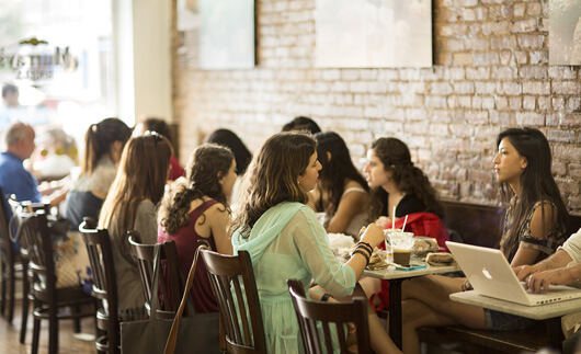 Customers sitting inside the store.
